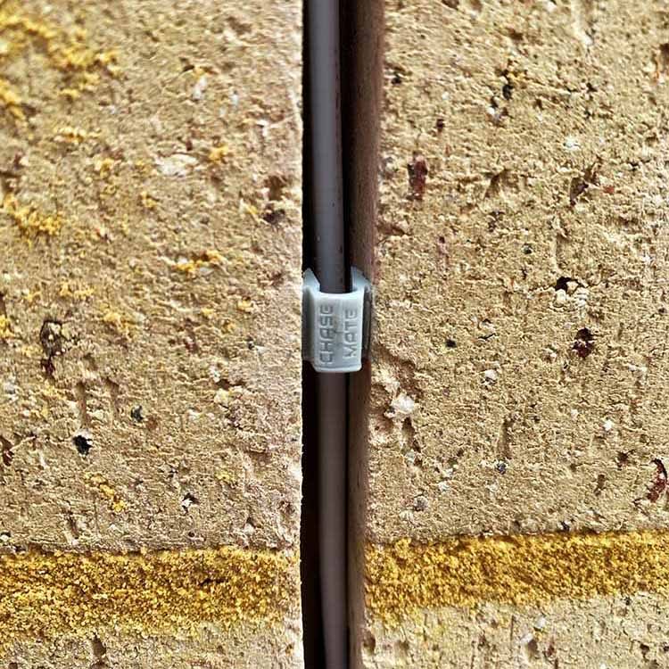 ChaseMate plug holding the line in a chased channel